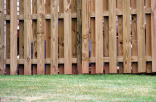 Residential house in Cheyenne WY installed a board on board fence to secure dogs from getting out.