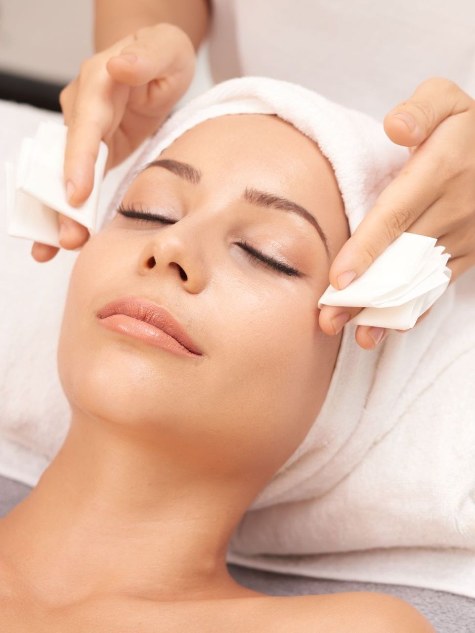 having facial treatment