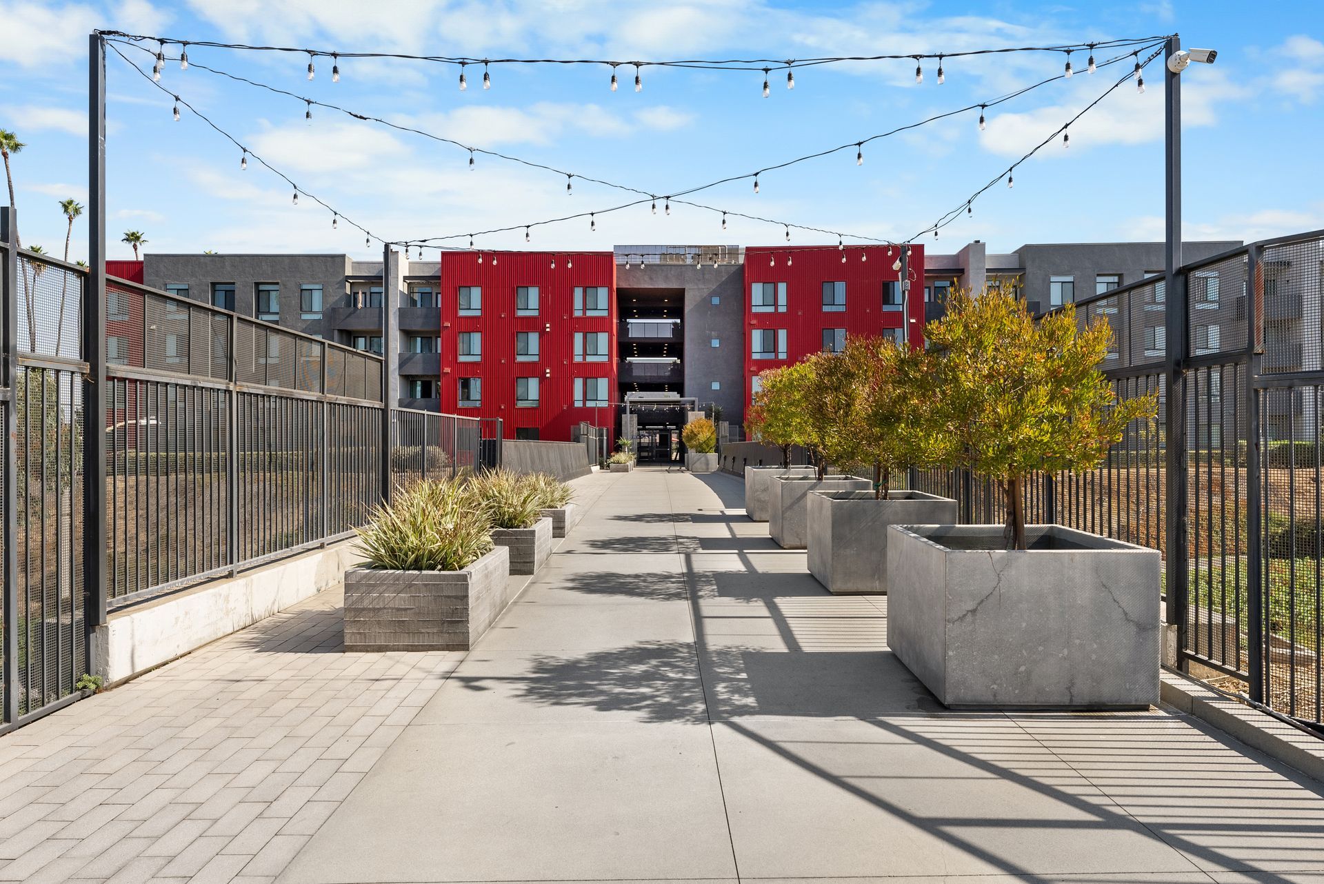 Walkway with lights to building exterior