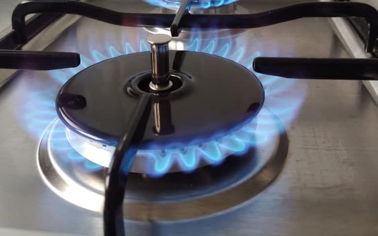 A Close Up Of A Gas Burner With Blue Flames β ARK Plumbing & Gasfitting In Moss Vale, NSW