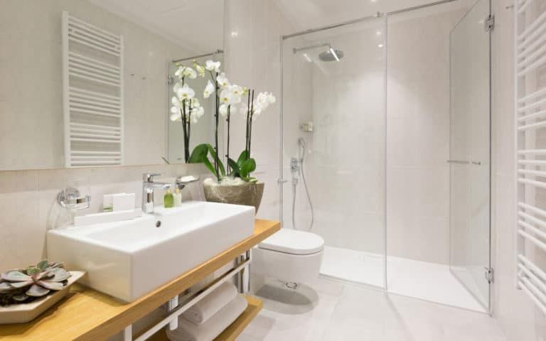 A Bathroom With A Sink , Toilet , Shower And Mirror — ARK Plumbing & Gasfitting In Bundanoon, NSW