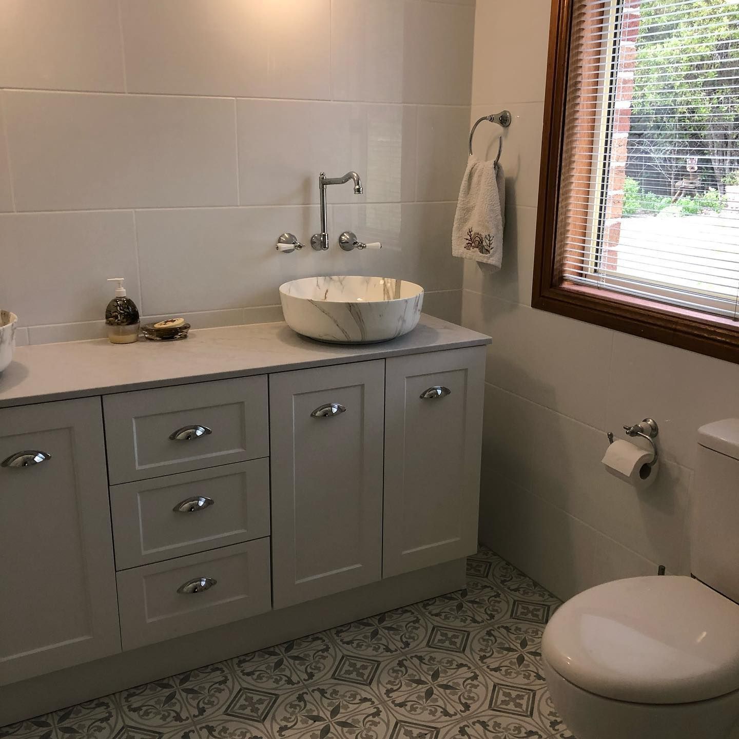 A Bathroom With A Sink , Toilet And Window — ARK Plumbing & Gasfitting In Bowral, NSW