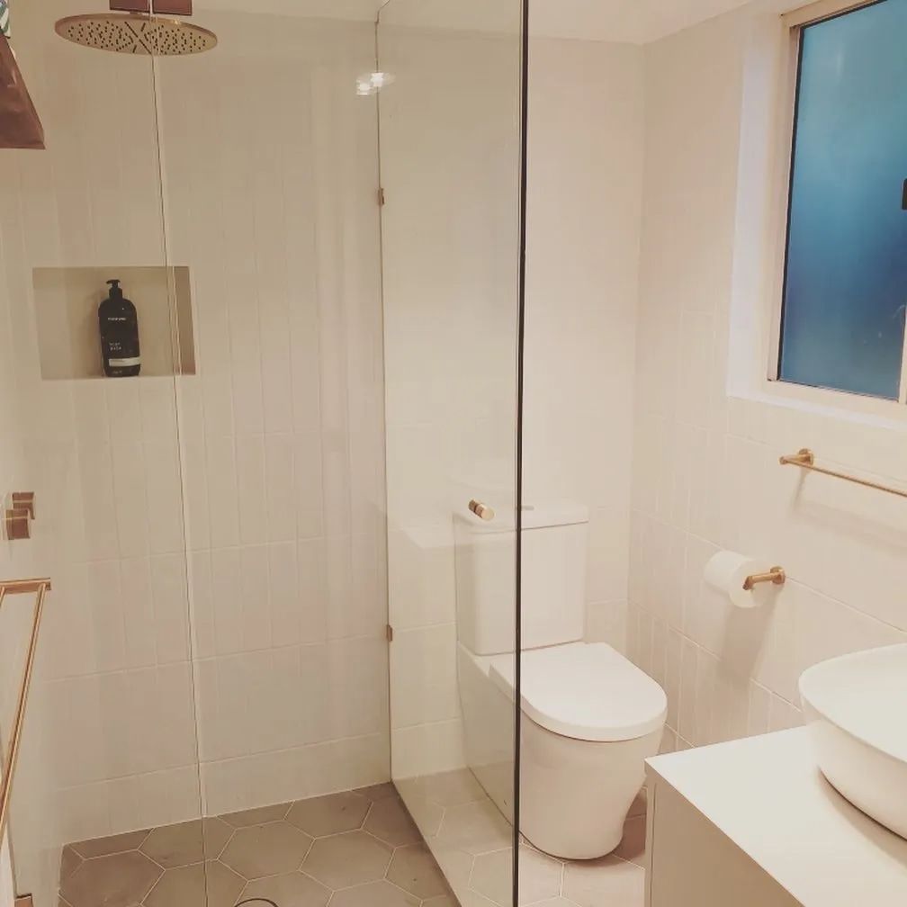 A Bathroom With A Toilet , Sink And Shower — ARK Plumbing & Gasfitting In Exeter, NSW