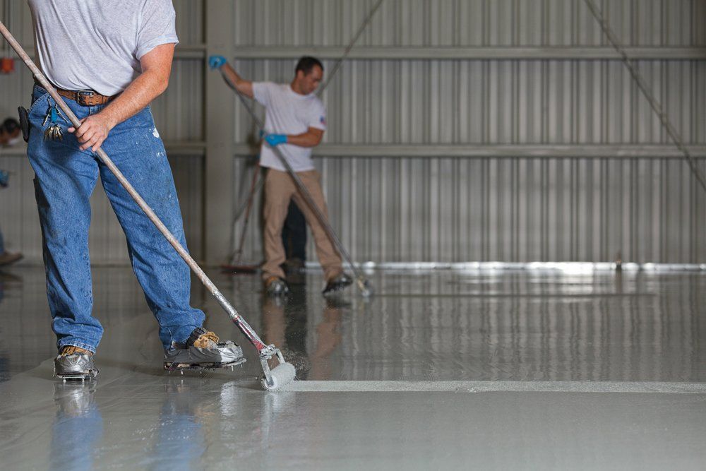 Applying Epoxy Paint — Elizabeth Hills, NSW — G&G Painting & Decor