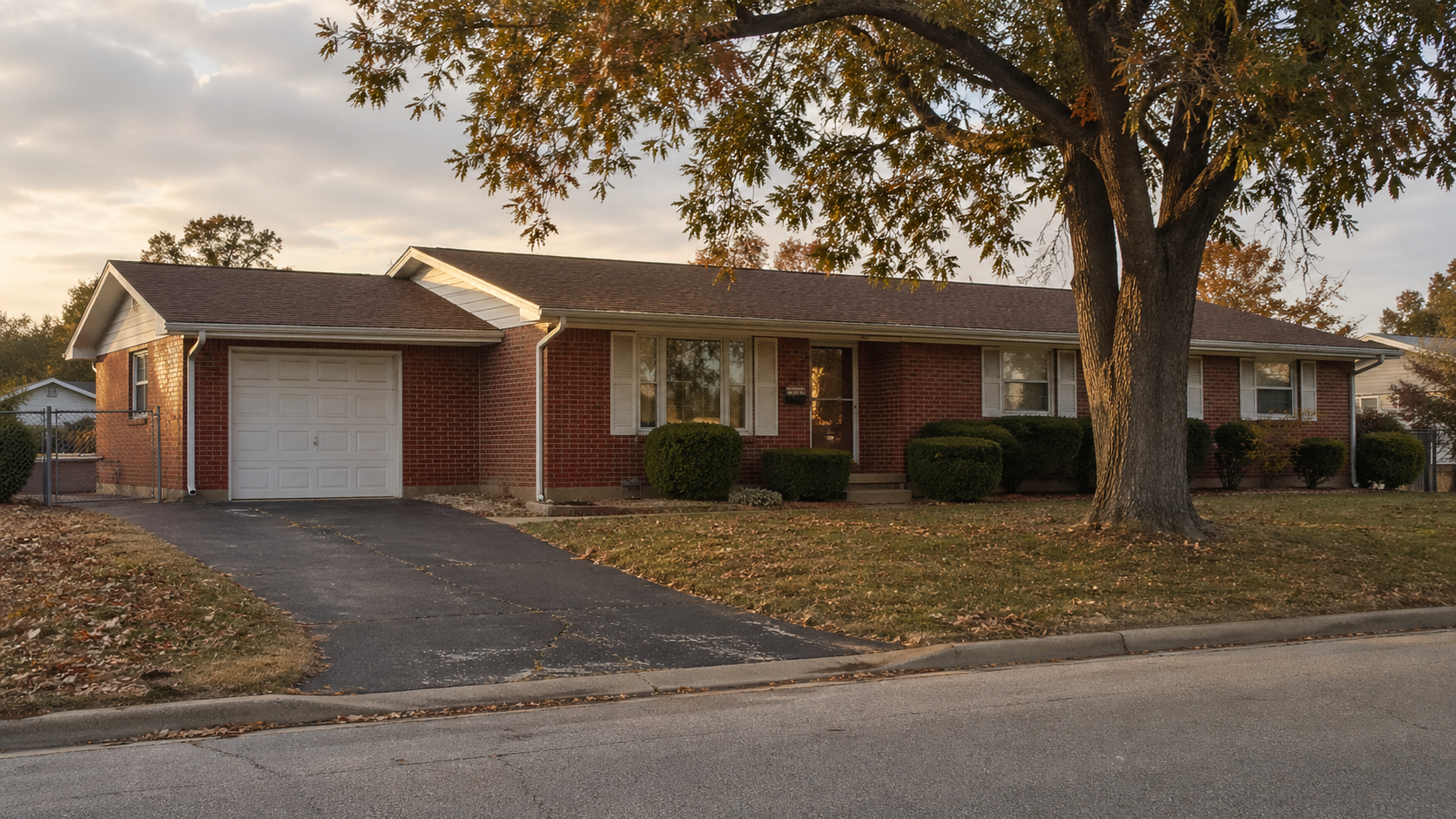 Brick ranch home in Florissant, Missouri at sunset, typical of probate and inherited properties