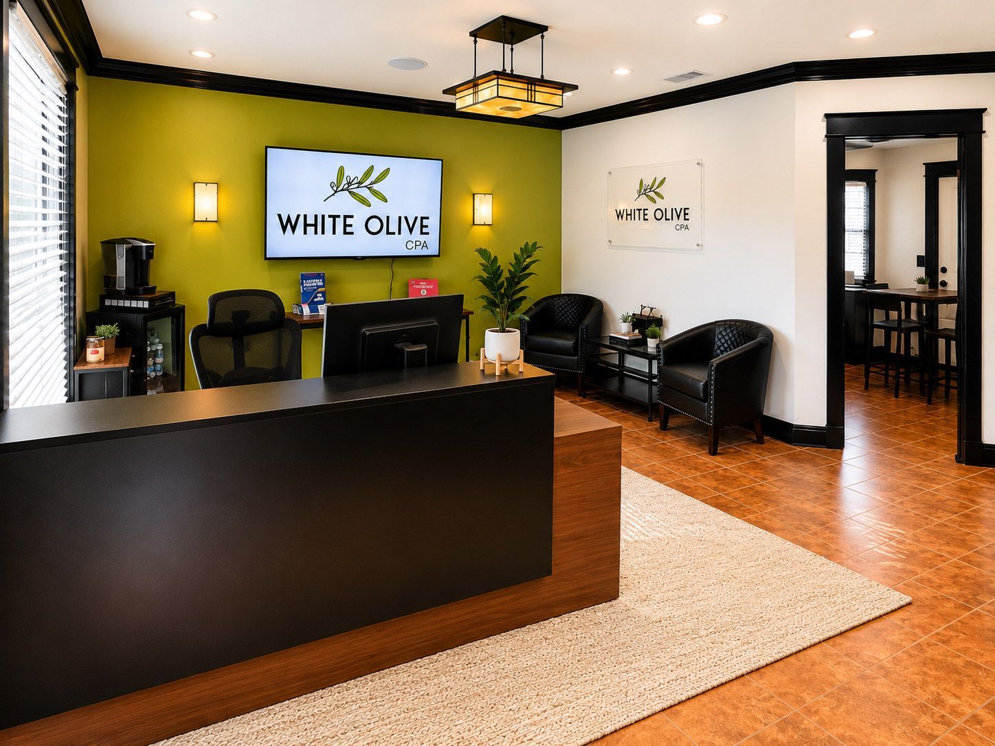Modern lobby with reception desk, white walls, wood floor, and chairs; “White Olive CPA” in Franklin TN