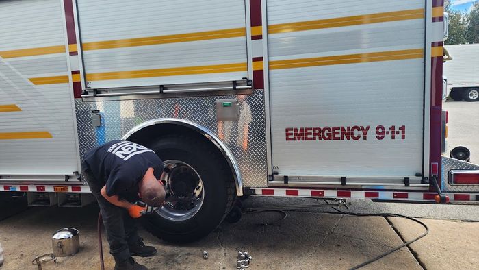 Mechanic Working on the Wheel of a Fire Truck | Tire Tech