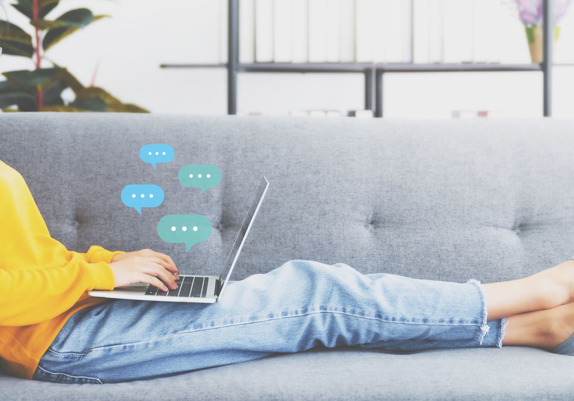 Female sitting on sofa and chatting live