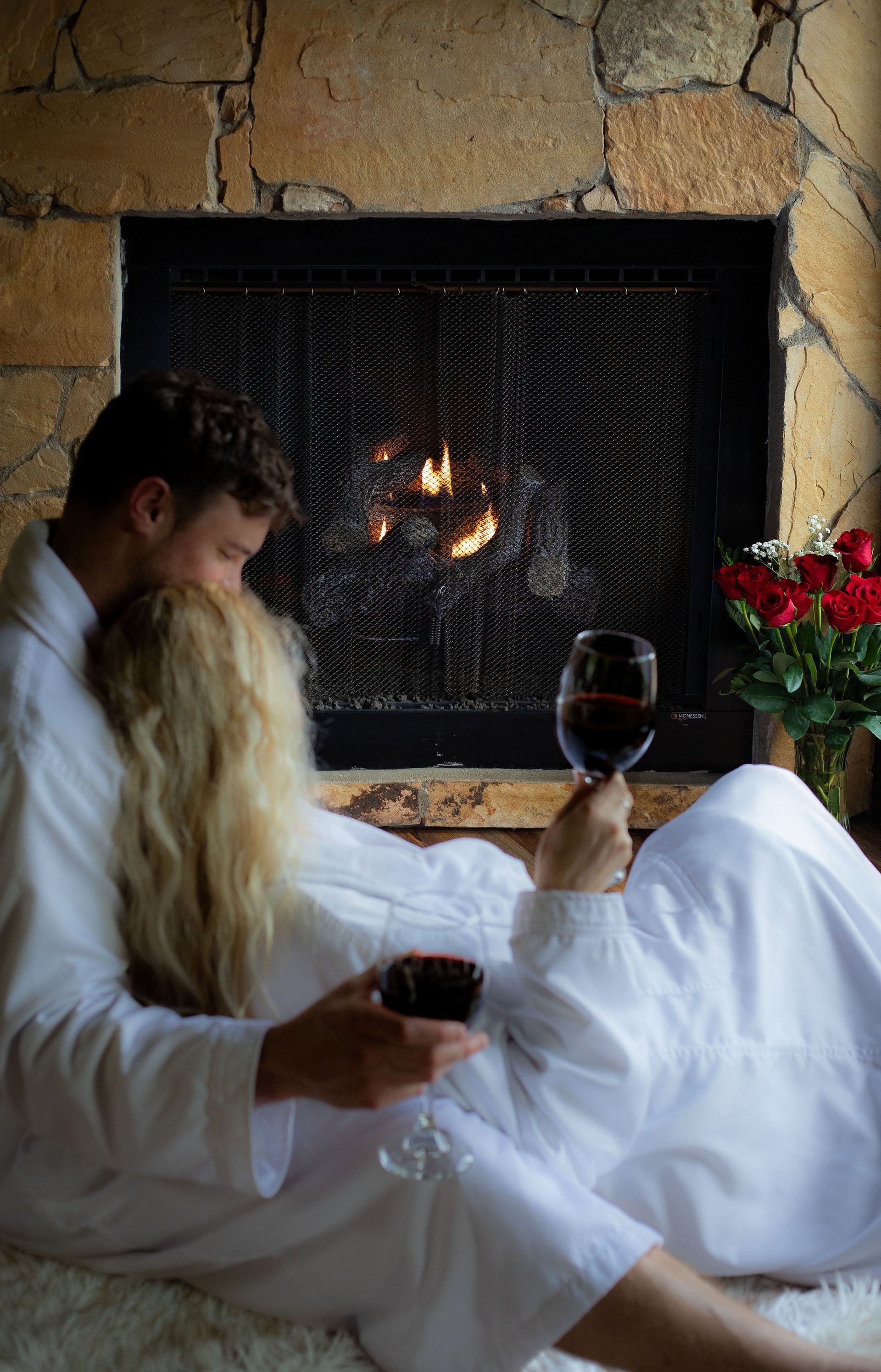 The Art of Togetherness Retreat Couple by the Fireplace