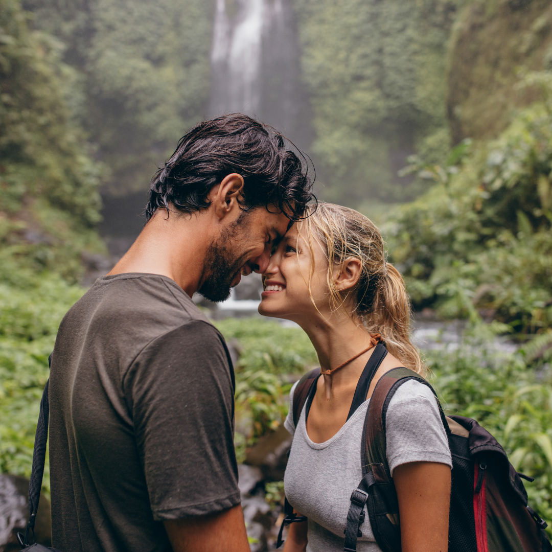 A group of people are hiking in the woods.