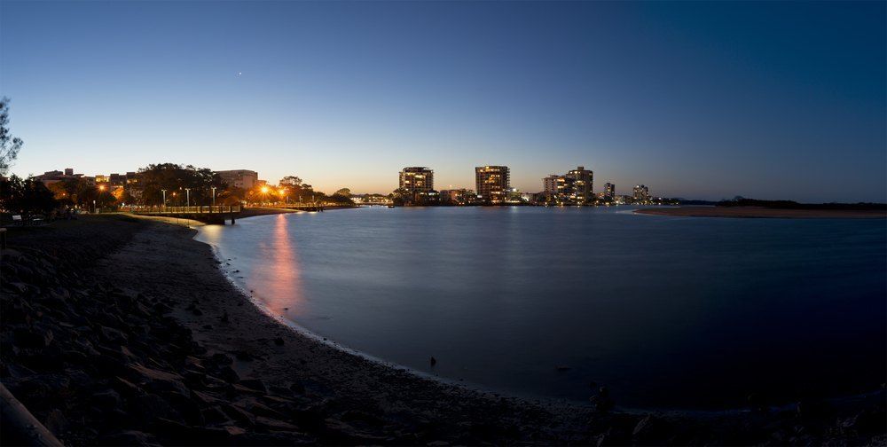 A Large Body of Water With a City in the Background — Action Air N Elec in Maroochydore, QLD