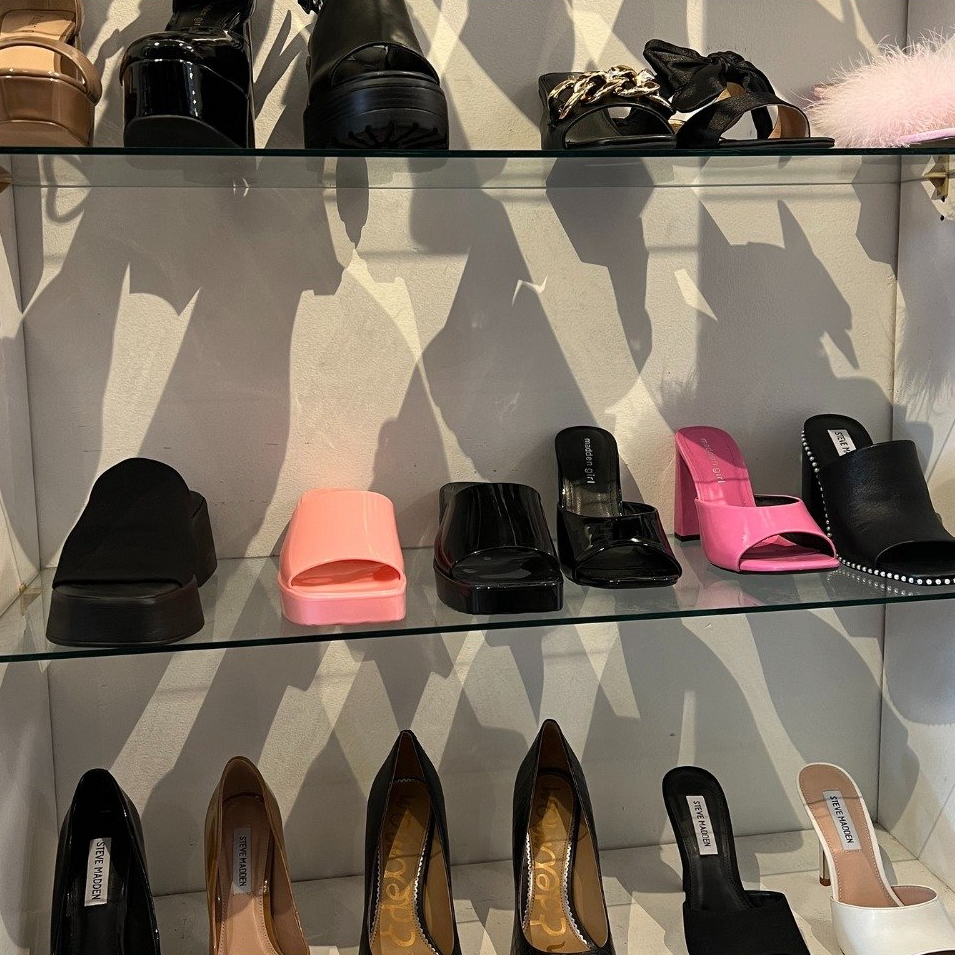 A display of shoes with the word steve madden on the bottom shelf
