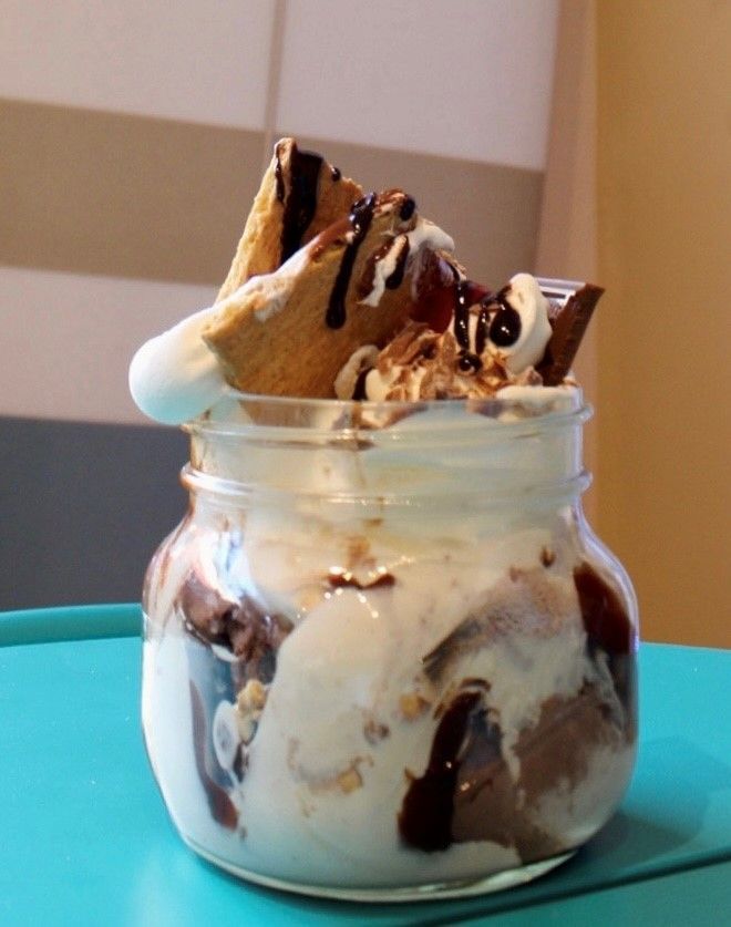 A s'mores sundae in a jar on a table