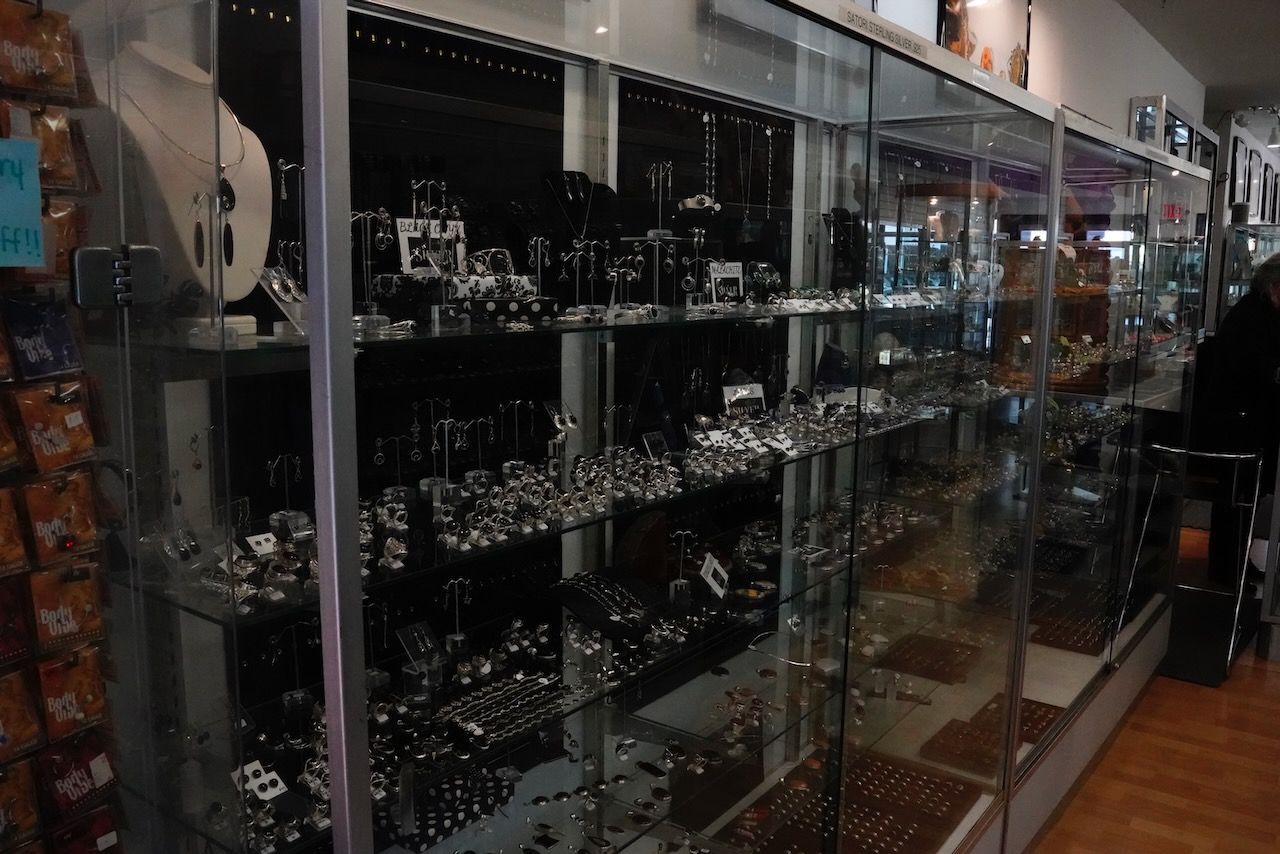A store with a sign that says ' jewelry ' on it