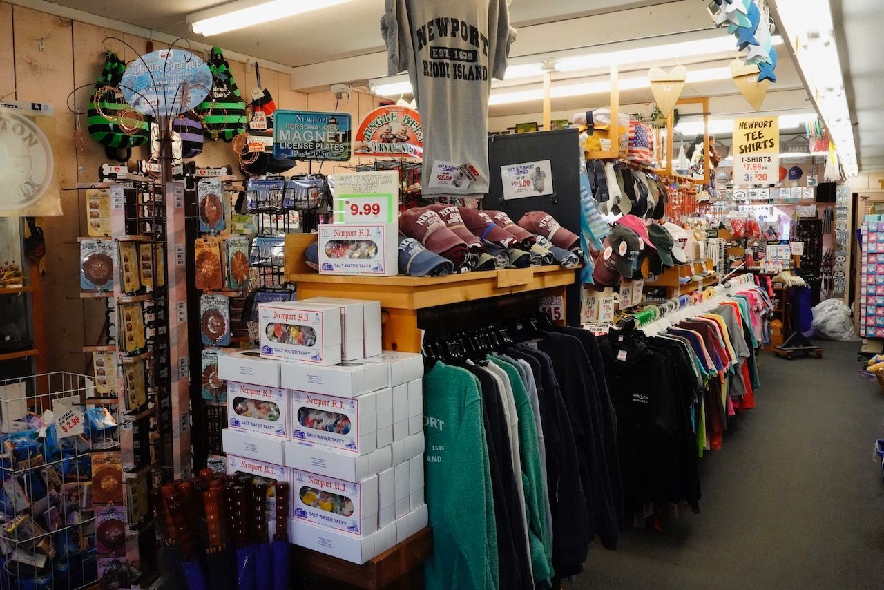A store filled with lots of shirts and hats