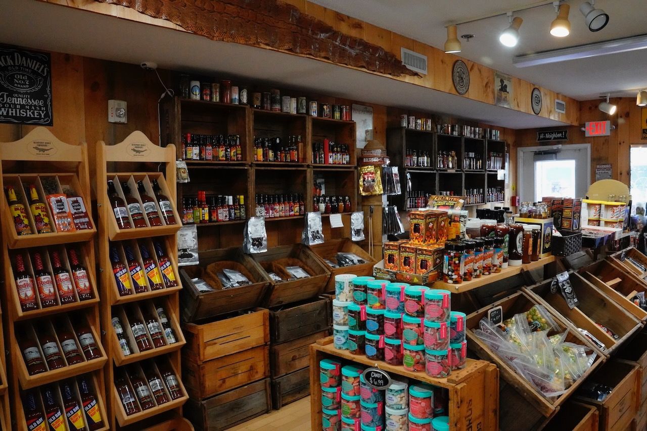 A store filled with lots of shelves and boxes of food.