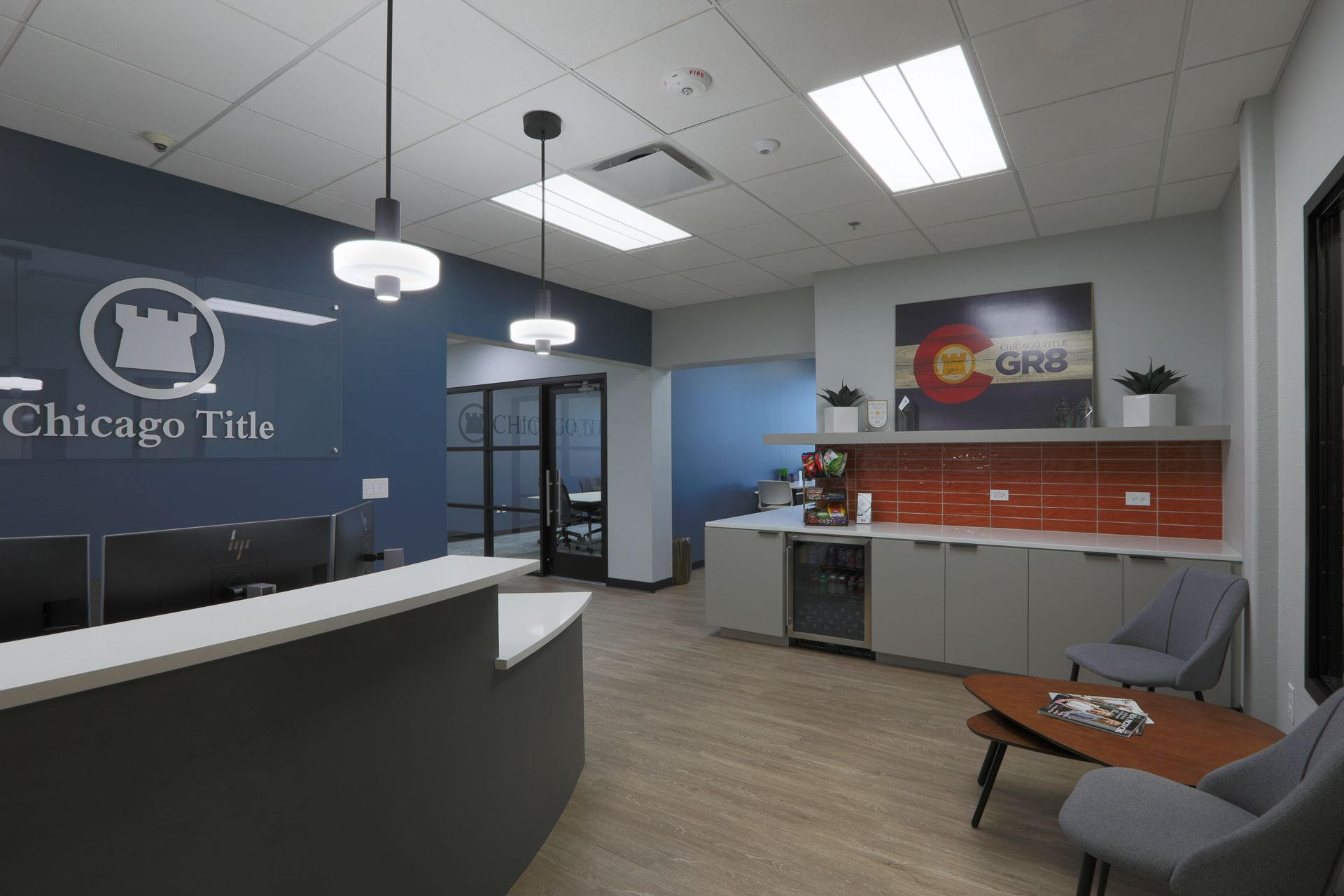 Chicago Tile showroom lobby with reception desk, seating, and display shelves