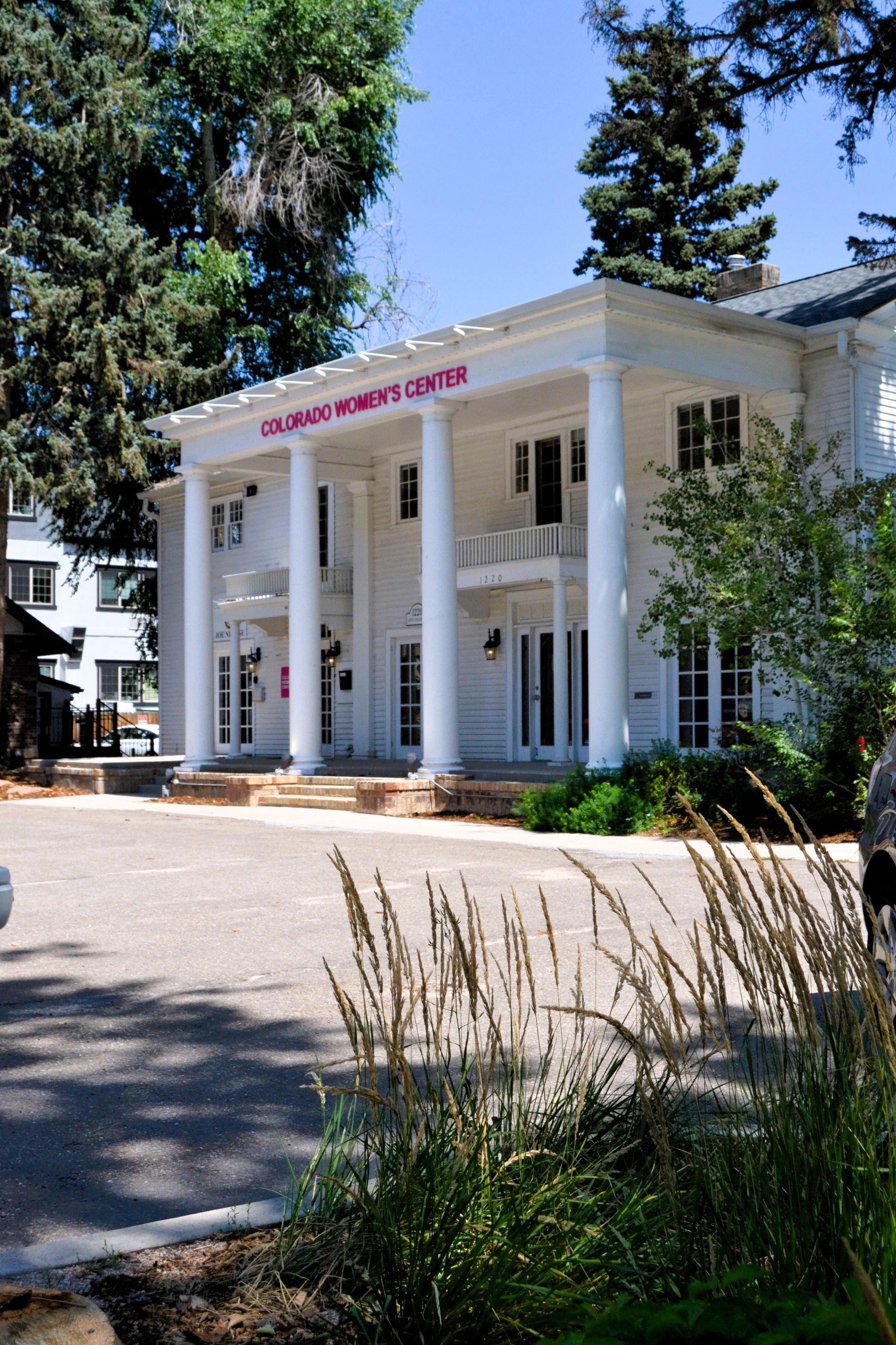 White building with pillars, 