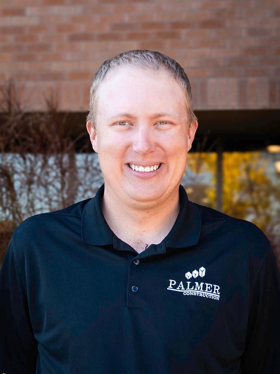 Man wearing black polo with
