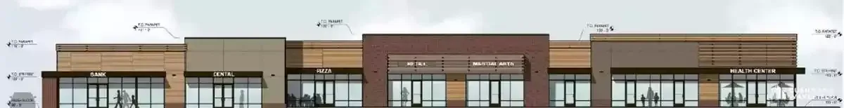 Exterior building facade with glass windows and a flat roof. Earth tone colors.