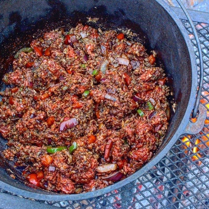 fall festive chili cooked ingredients in cast iron pan