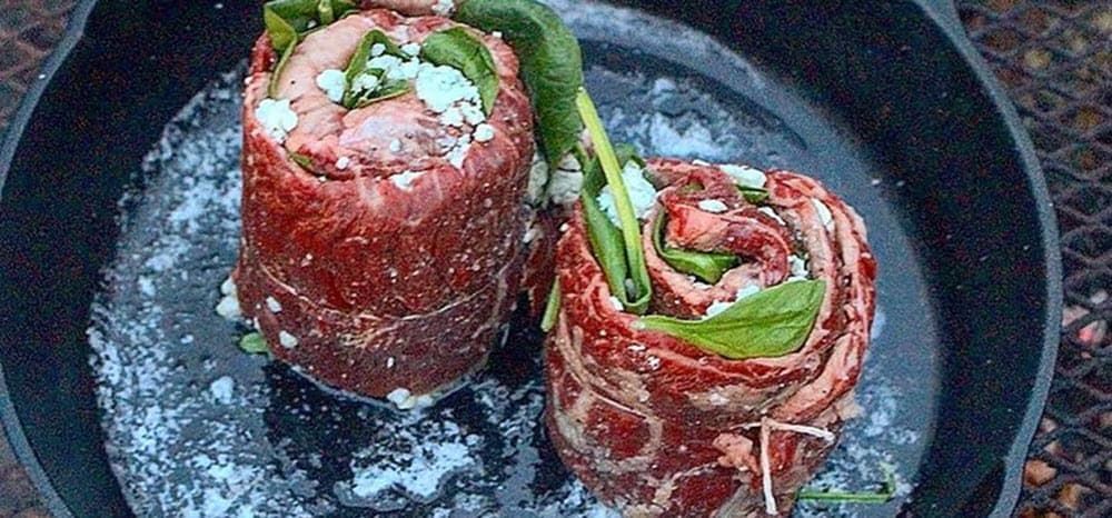 skirt steak rolled into pinwheels in a cast iron pan; how to cook a steak in a cast iron skillet