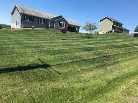Light Green Grass With Houses — Pine Valley, NY — Snow Chasers LLC