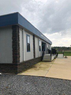 Sideview Picture Of Office With Blue Roof - Jackson, MS - Promodular LLC