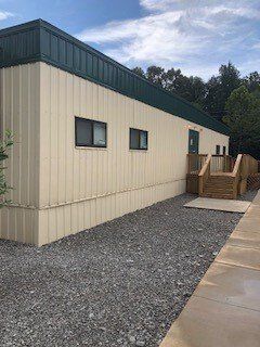Side View Picture Of Office Building Near Path Walk - Jackson, MS - Promodular LLC