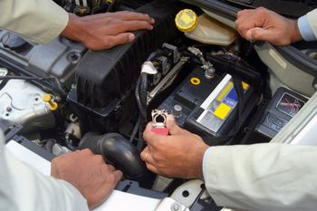 Mechanics Checking Car Batteries | Scotts Valley, CA | Rogers Automotive Mechanics Checking Car Batteries | Scotts Valley, CA | Rogers Automotive