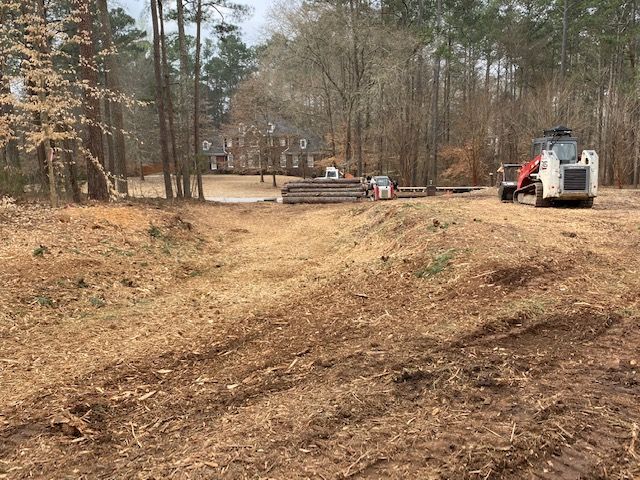 Open Field with Machine— Loganville, GA — Georgia's Best Clearing & Grading