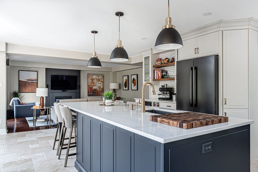 There is a large island in the middle of the kitchen.