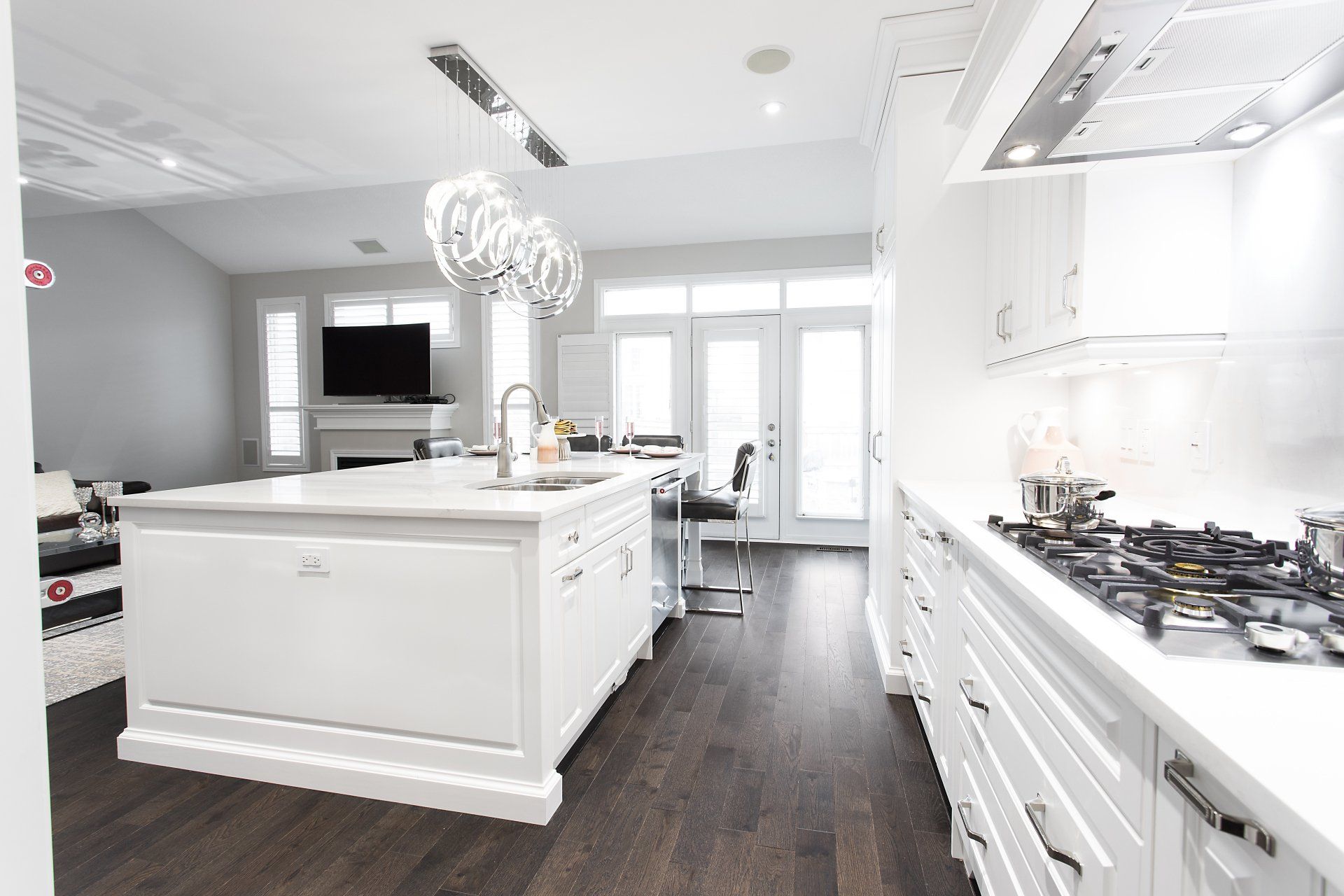 There is a large island in the middle of the kitchen.