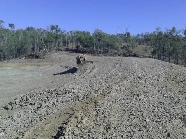 Big Land Cleaning By A Bulldozer — Mike Barlow Earthmoving Pty Ltd in Rockhampton, QLD