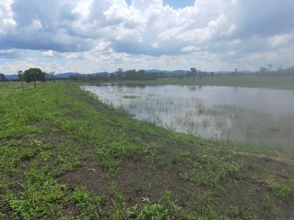 Wide View Of Lake With Cloudy Sky — Mike Barlow Earthmoving Pty Ltd in Rockhampton, QLD