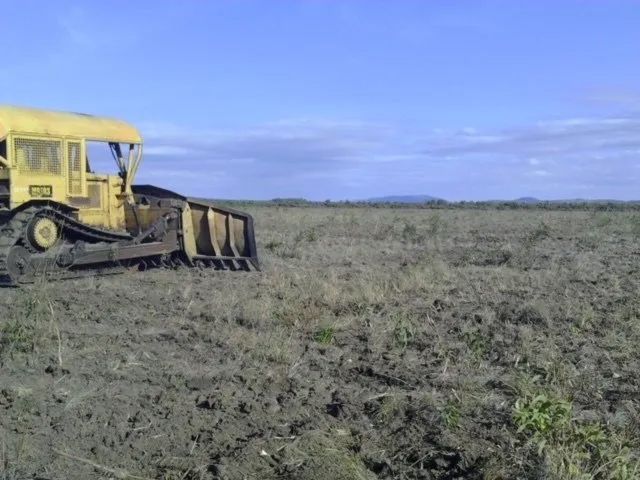 Side Angle Of The Excavator Land With Equipment Excavator In Front — Mike Barlow Earthmoving Pty Ltd in Rockhampton, QLD