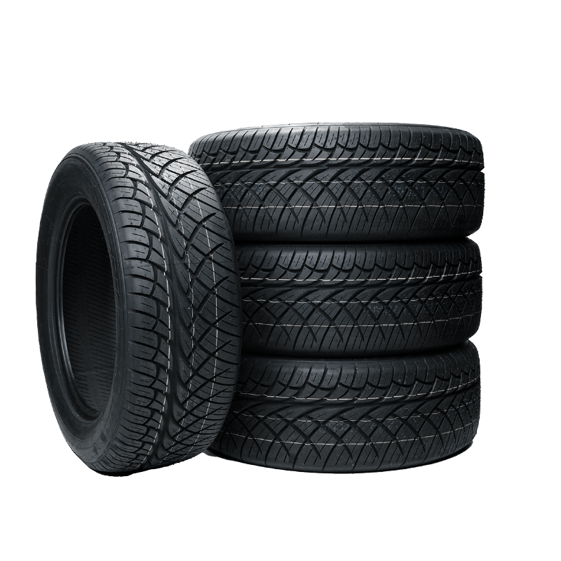 Four tires are stacked on top of each other on a white background.