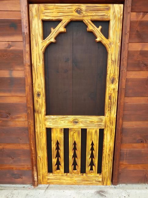 Door with 3 Pine Trees as Vertical Slats