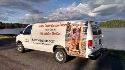 Company Van Parked by a Lake