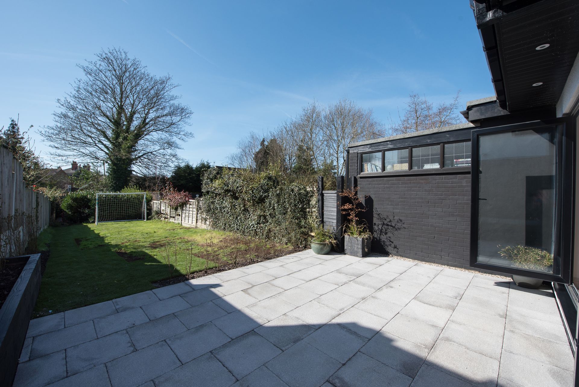 A set of concrete stairs leading up to a garage.