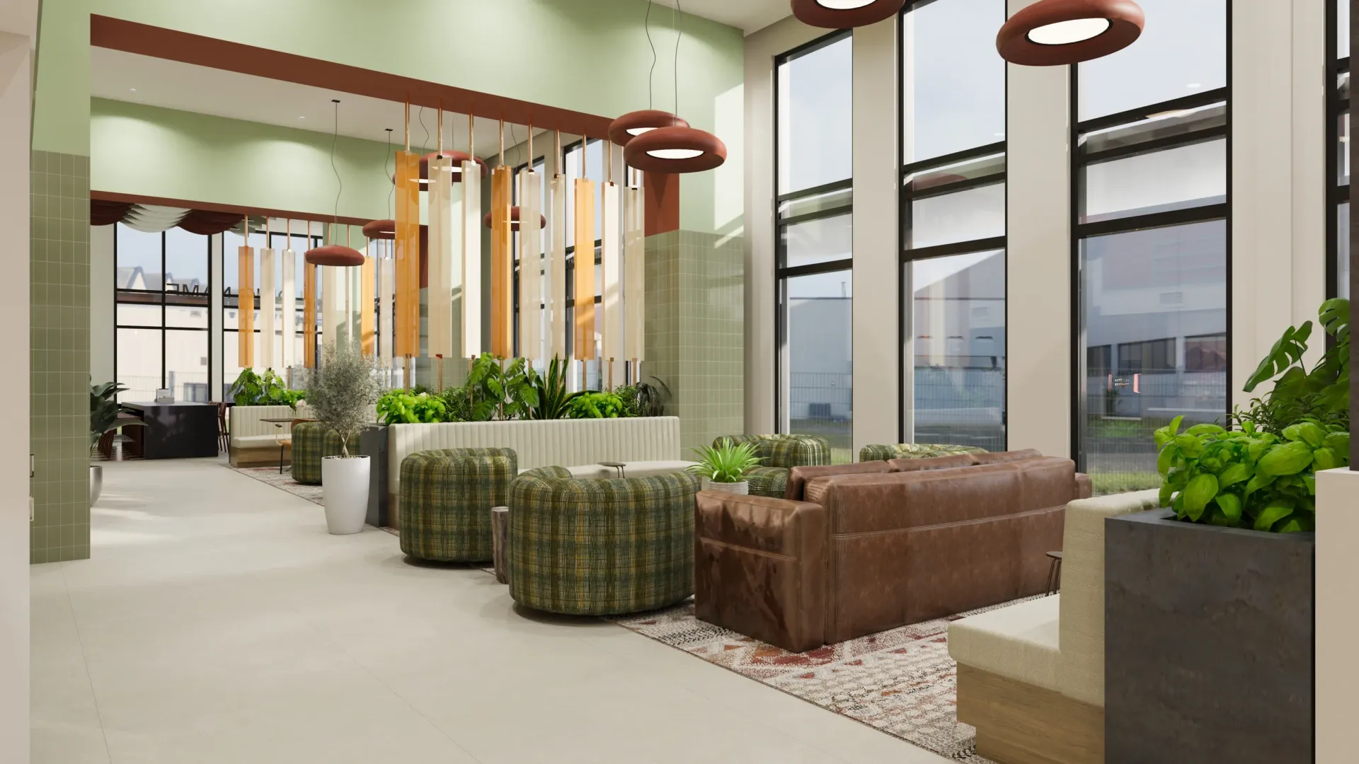 Modern lobby with comfortable seating areas and lush plants.