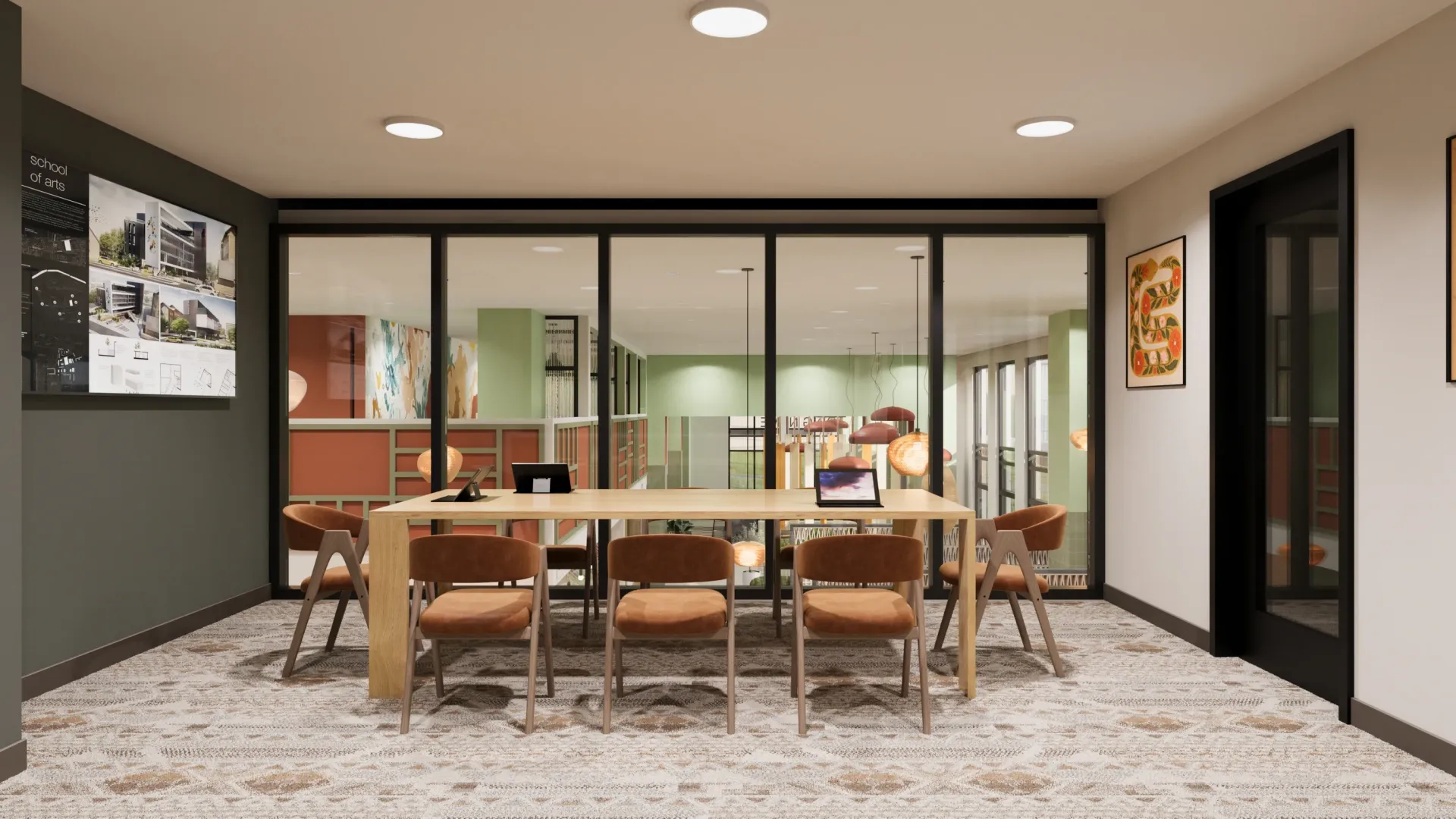 Modern conference room with a long wooden table, chairs, and laptops, overlooking a colorful interior space.