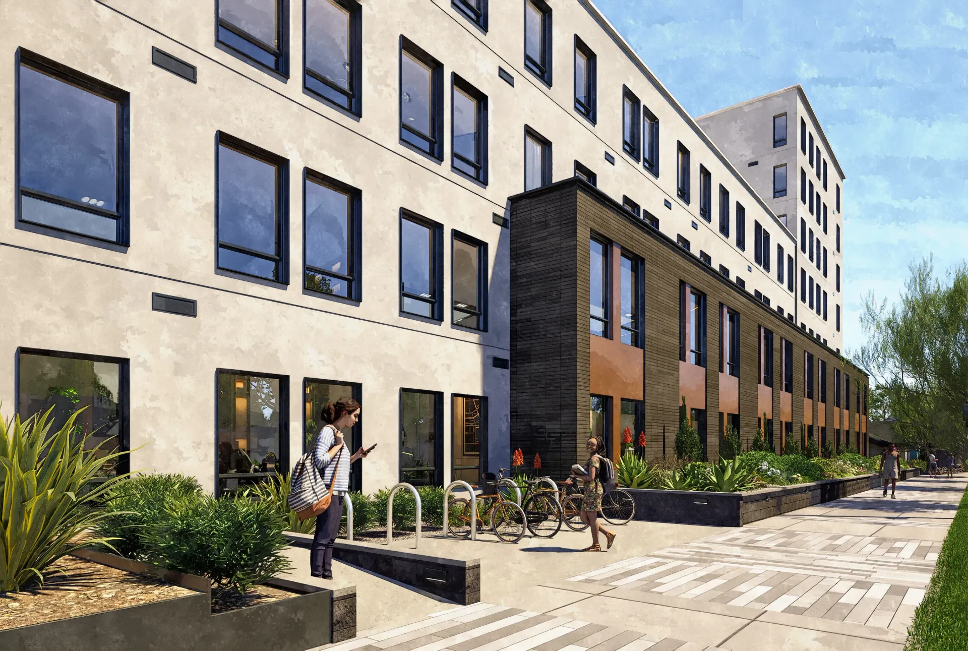 Exterior view of a modern apartment building with bicycles parked outside.
