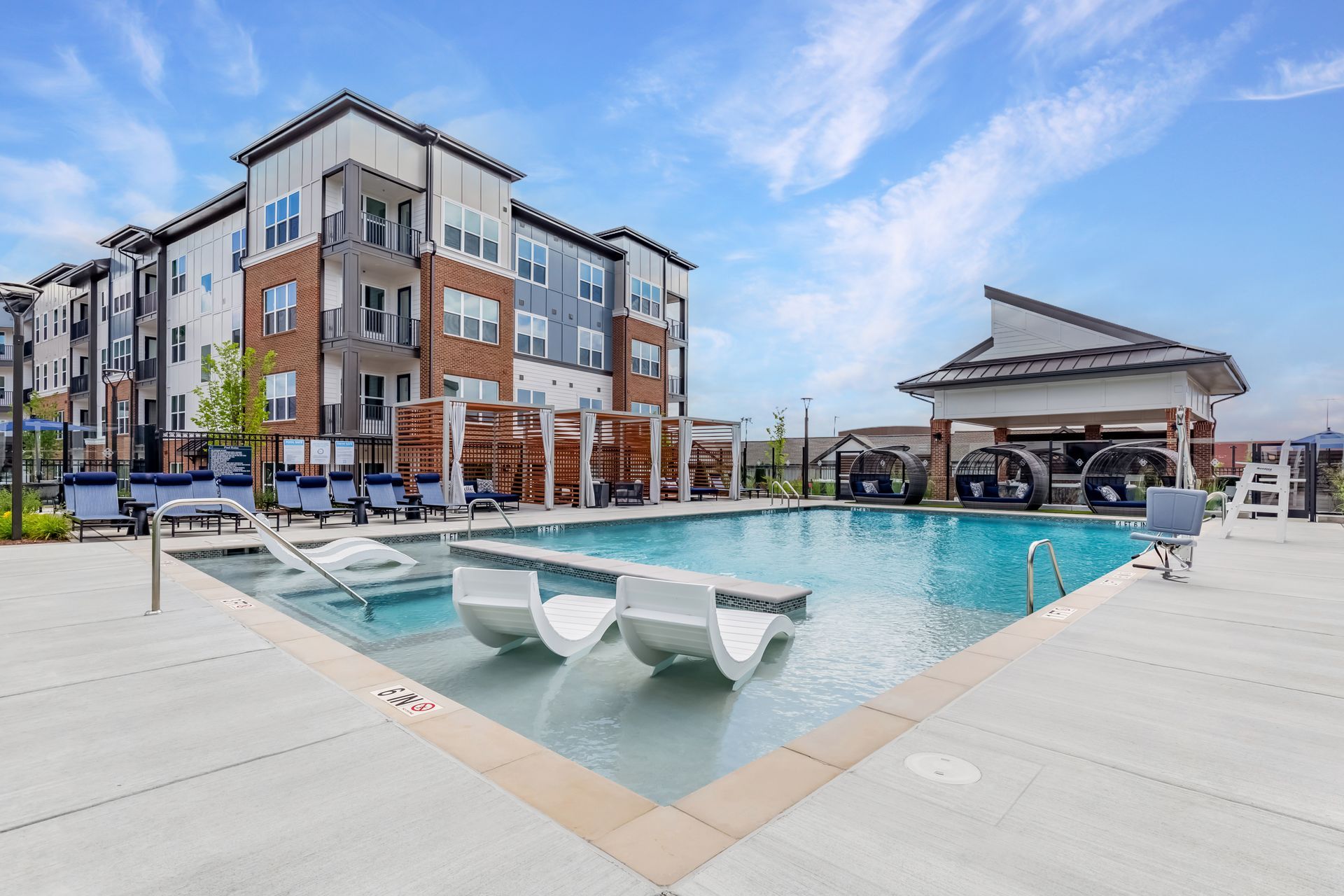 Image of swimming pool and building exterior.