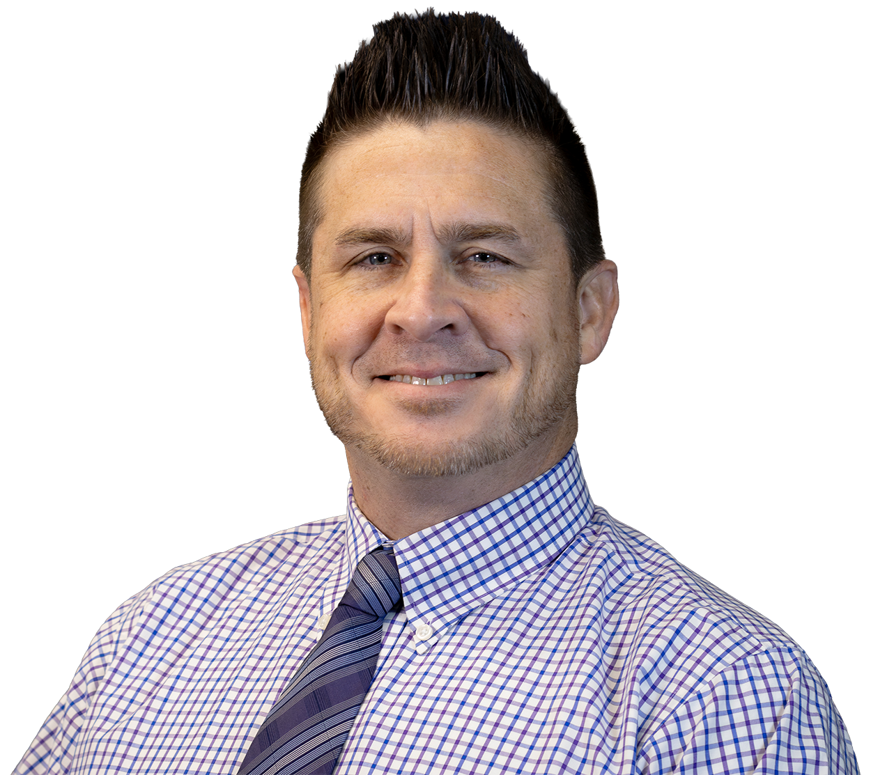 Headshot of a smiling man in a blue checkered shirt and tie against a white background