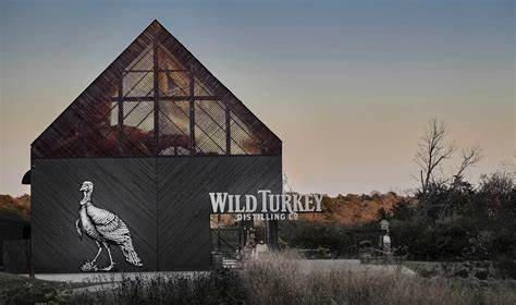 A turkey is painted on the side of a building.