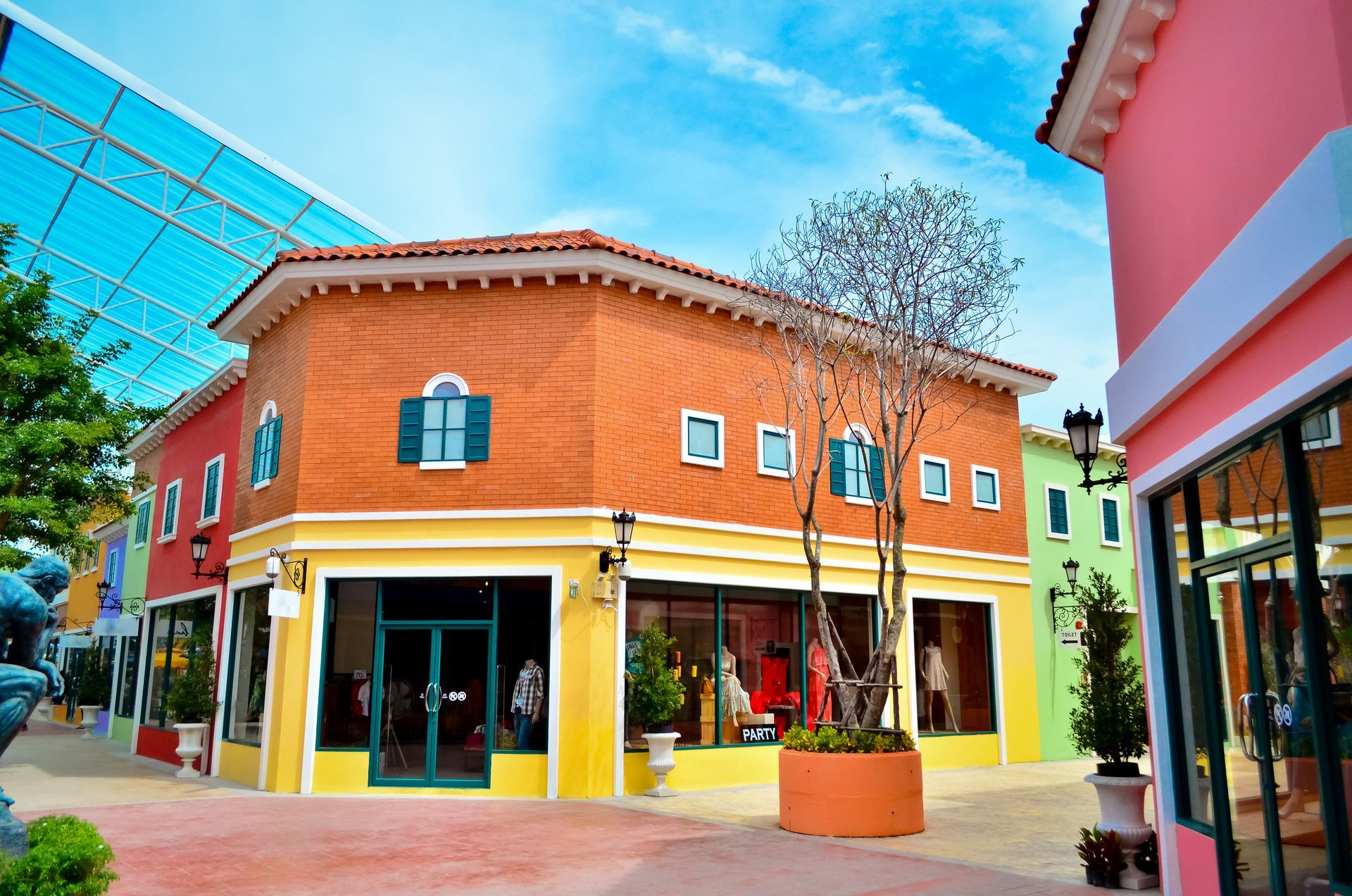 A row of colorful buildings in a shopping mall