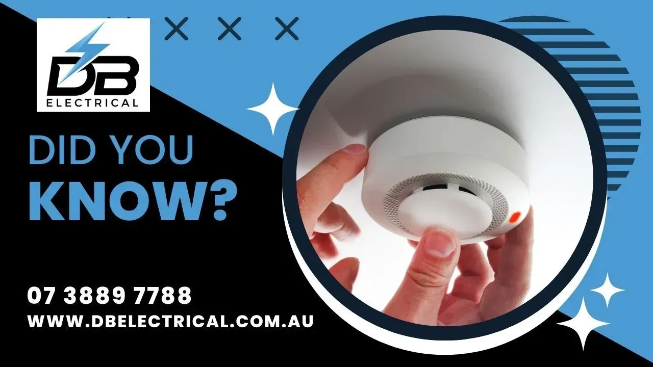 A Person Is Installing A Smoke Detector On The Ceiling – Brendale, QLD - DB Electrical
