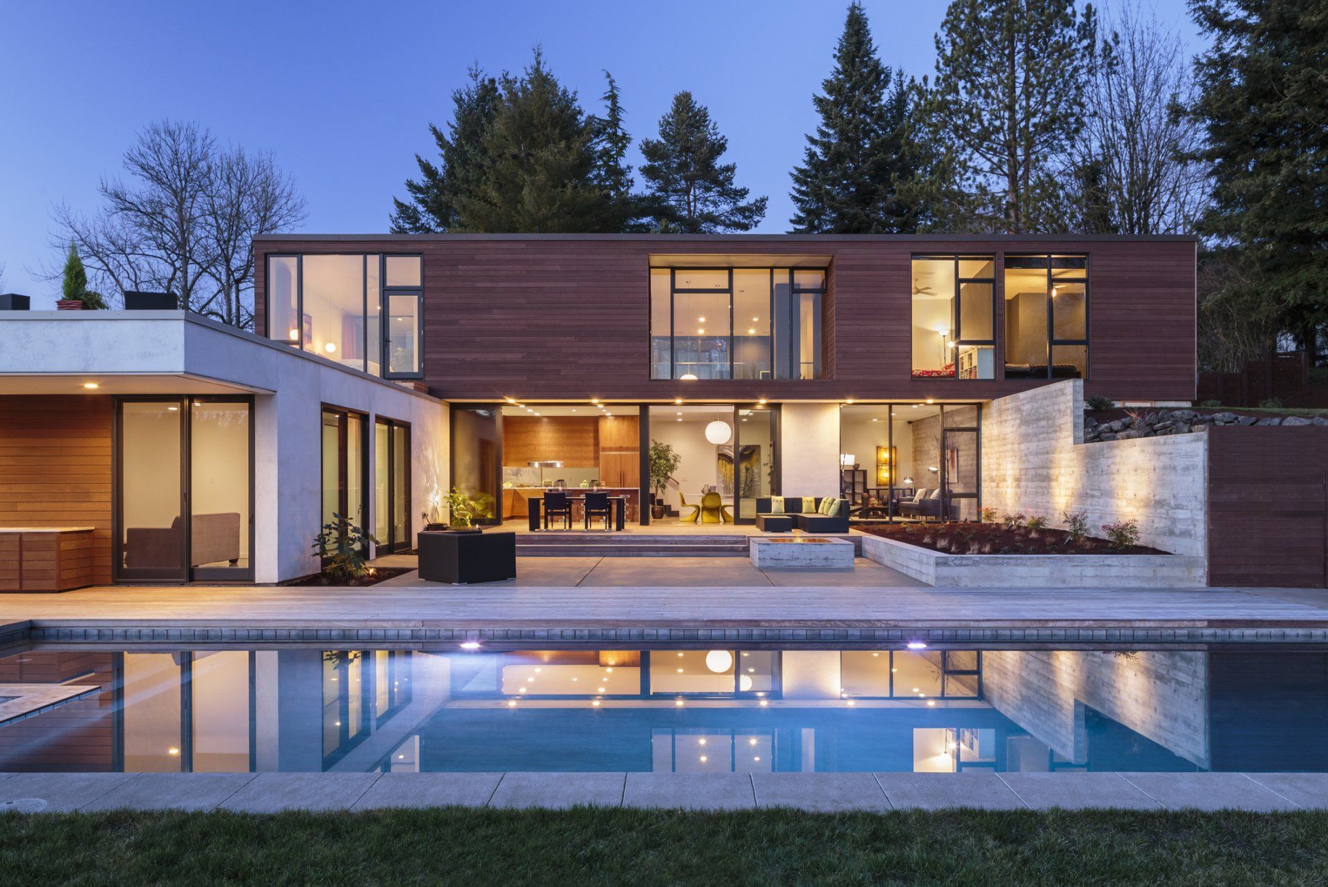 A Modern House With A Large Swimming Pool In Front Of It – Brendale, QLD - DB Electrical