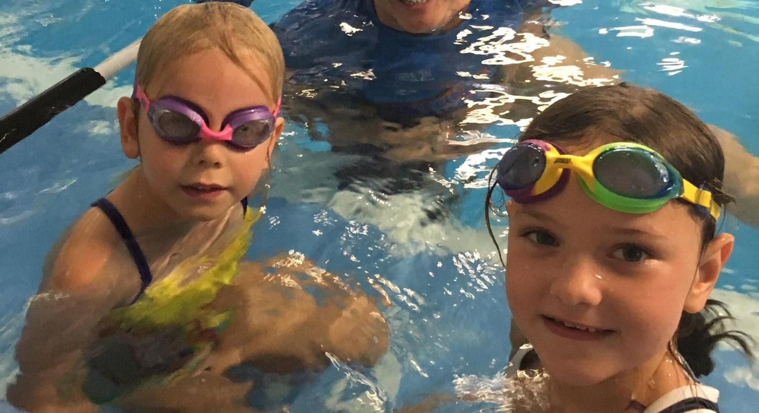 Two Girls With Swimming Instructor โ Swim Care Boambee in Boambee, NSW